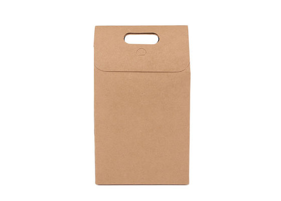 Le cadeau de papier de Brown emballage de Noël met en sac le sac de papier de place de déjeuner avec des poignées