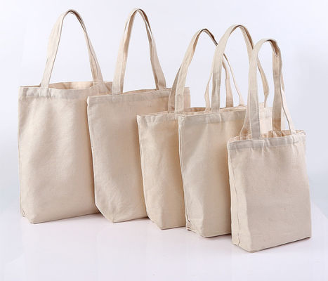Les femmes pliées d'achats de Tote Bags de toile de 14OZ 16OZ manipulent des sacs